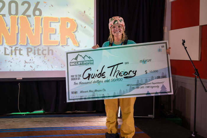 Ski Lift Pitch In-New Mexico winner, Guide Theory. holding up big check.